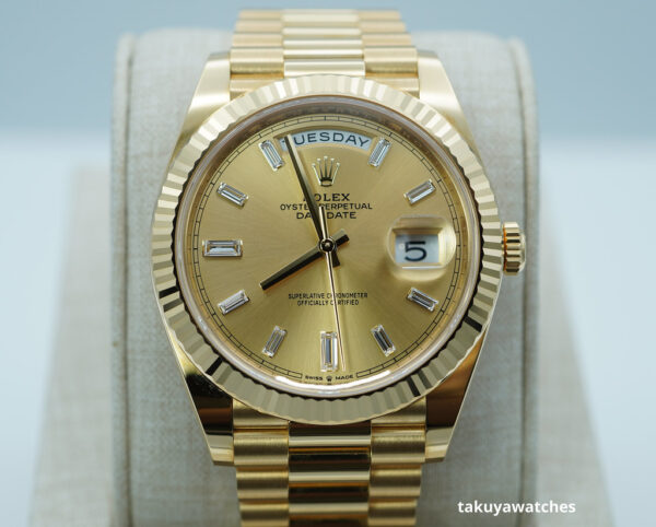 Rolex 228238 DAY DATE 40 YELLOW GOLD CHAMPAGNE BAGUETTE DIAL 2023 FULL SET