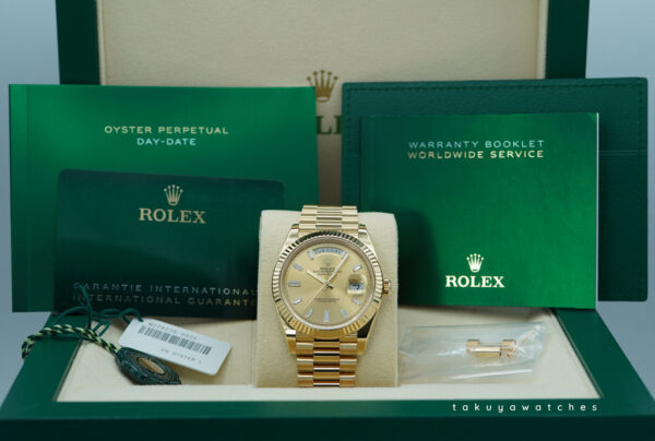 Rolex 228238 DAY DATE 40 18K YELLOW GOLD CHAMPAGNE BAGUETTE DIAMOND DIAL 2022 FULL SET - Image 2